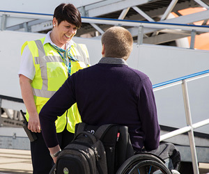 Special Assistance employee greeting a passenger at Bristol Airport
