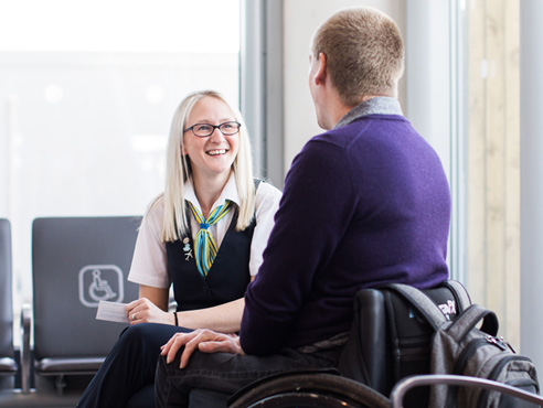 Special Assistance employee greeting a passenger at Bristol Airport